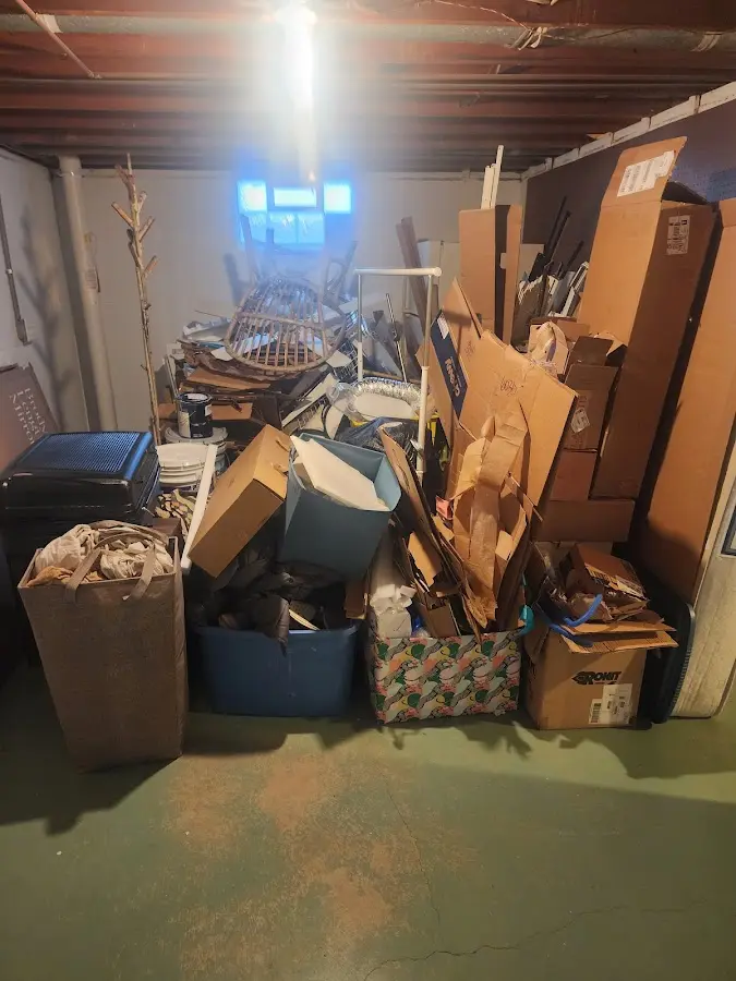 Roll-off dumpster container at job site for 4 Yard Dumpster Rental in Fort Walton Beach